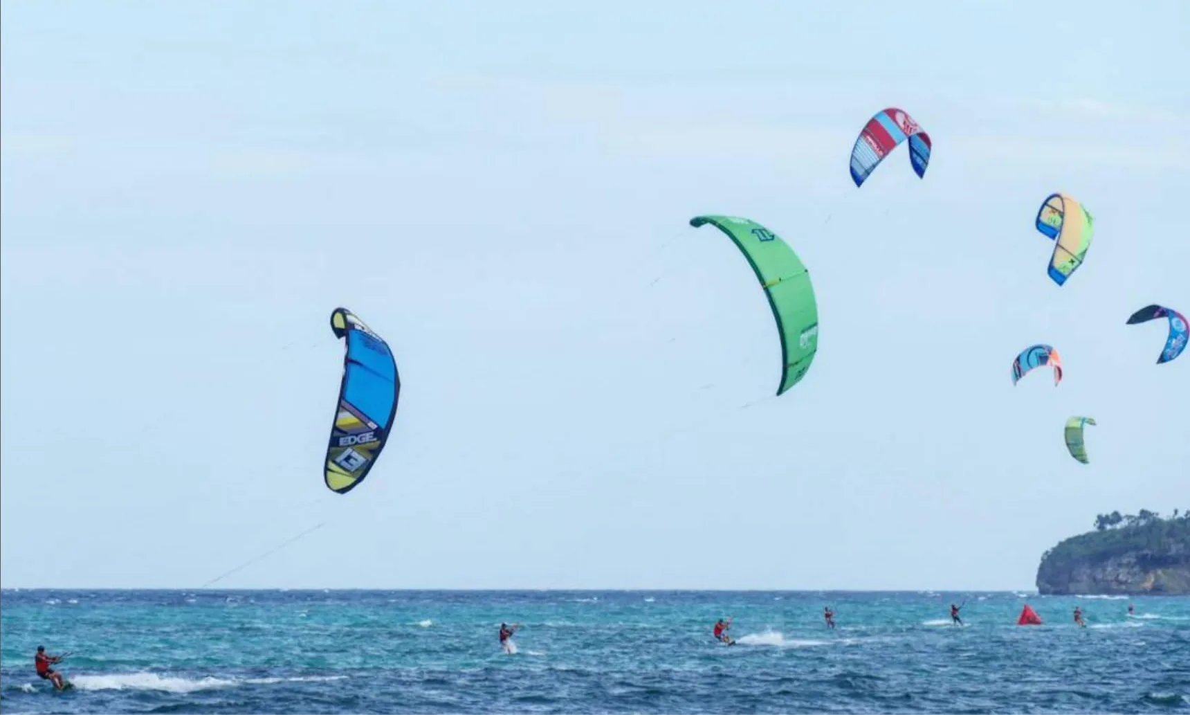 Kitesurfers riding the wind off Bulabog Beach, a short walk from The Lazy Dog